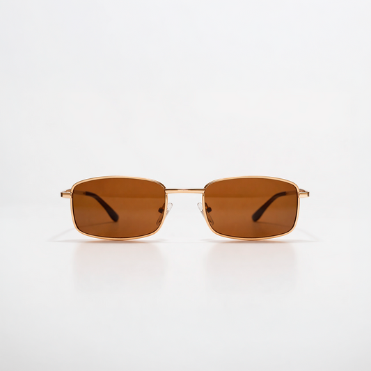 Gafas de sol rectangulares Cannes Riviera con montura metálica fina dorada y lentes en tono marrón cálido.