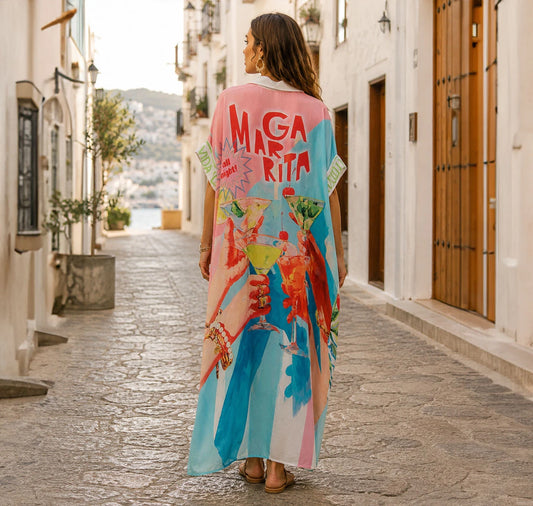 Vestido oversized lleno de color con estampados de langostas, limones y arte retro. Diseño fresco y divertido para tus vacaciones. ¡Cómpralo en Badhabitsx!
