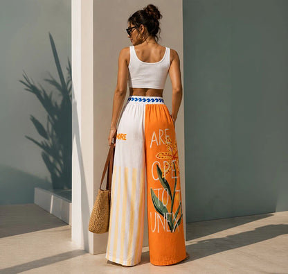 Pantalón resort con estampado de sombrillas vintage, botánica y rayas cálidas. Fresco, elegante y perfecto para tus días de verano frente al mar. ¡Consíguelo en Badhabitsx!
