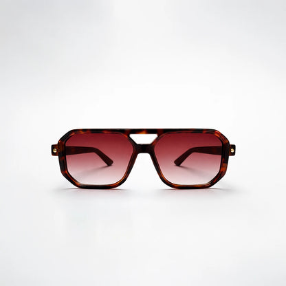 Gafas de sol de estilo aviador geométrico Miami Heat con montura gruesa de carey y lentes marrón degradado.
